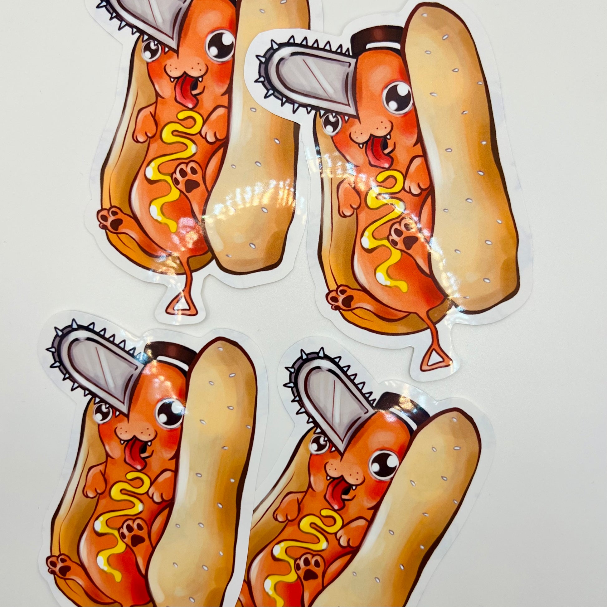 Cute Kawaii Original Pochita chainsaw devil hotdog art sticker placed on a journal page alongside anime aesthetic scrapbooking supplies.